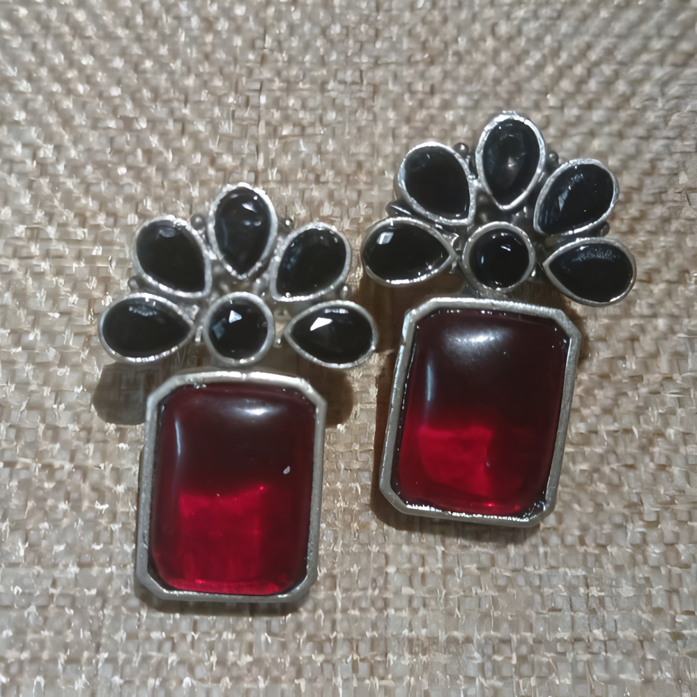 Elegant floral designearrings with red and black stones