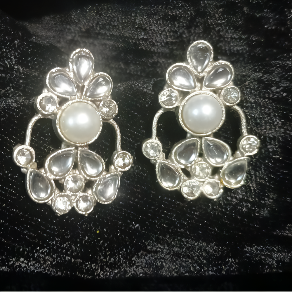 Pair of unique silver white stud earrings