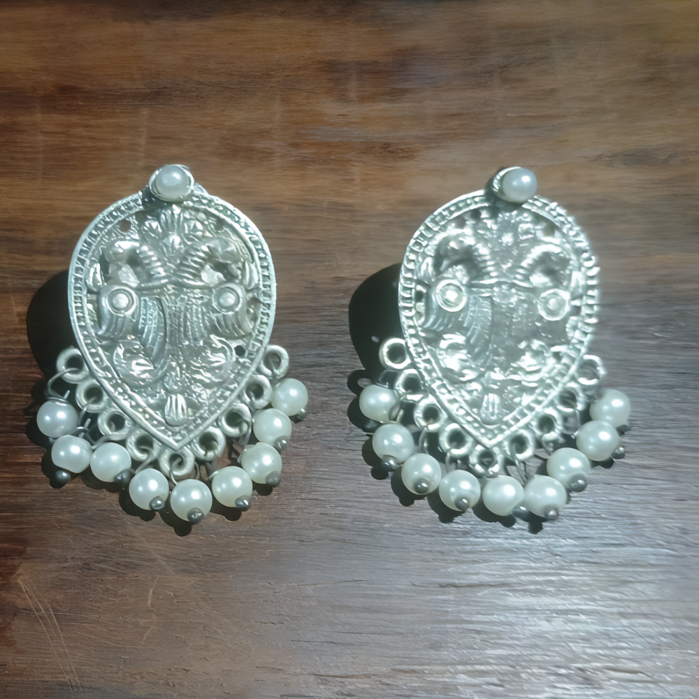 Pair of silver earrings for women with intricate designs and pearl-like beads