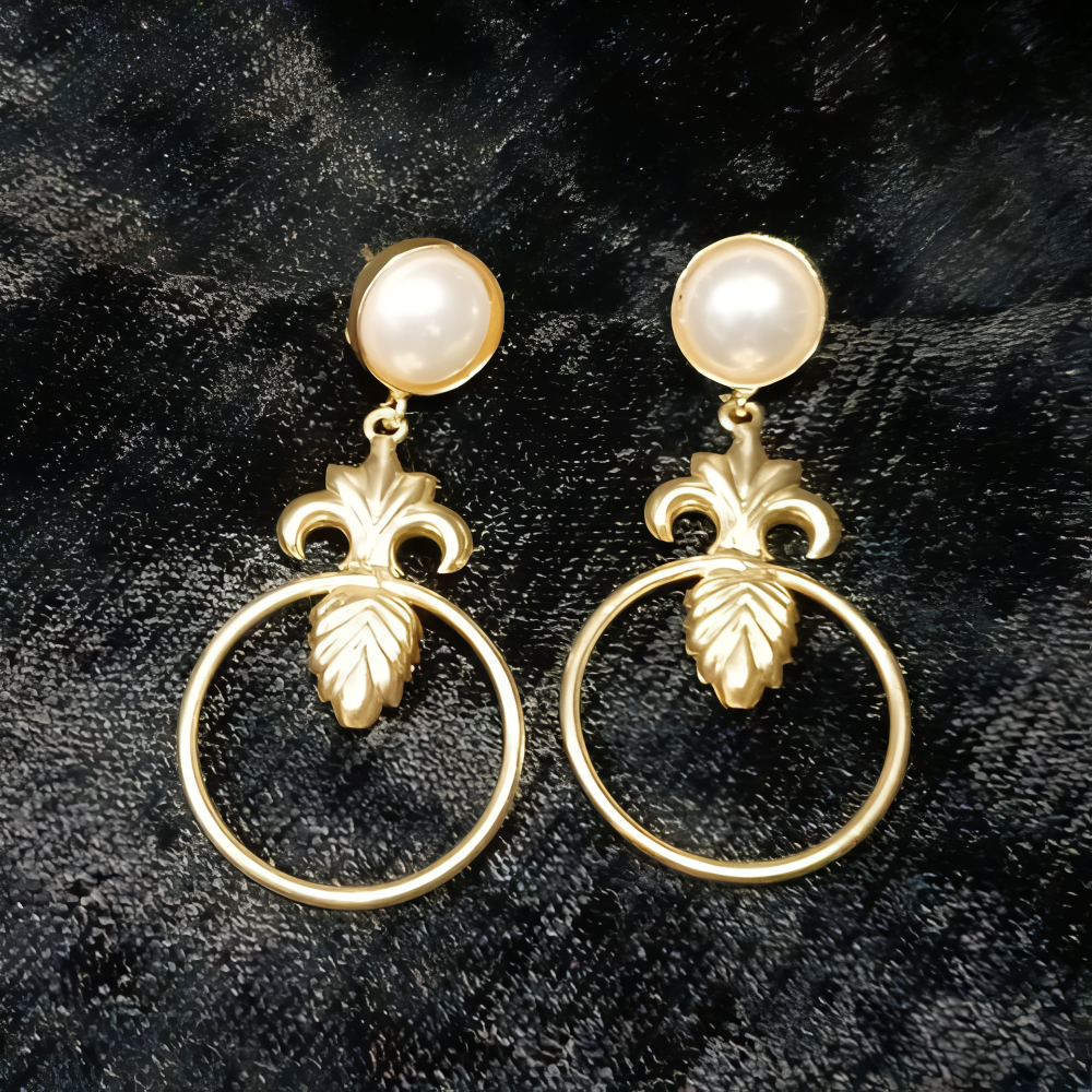 Stylish gold dangle earrings with white pearl