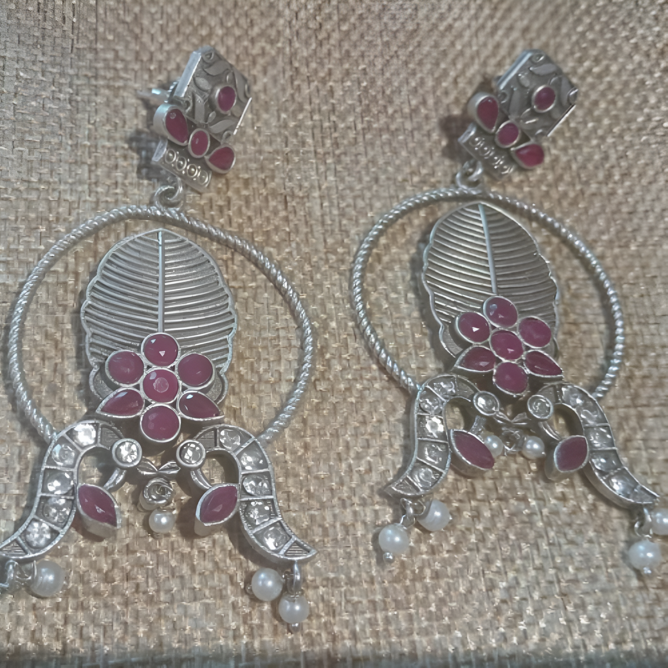 Long statement silver oxidised earrings with pink kundan stones