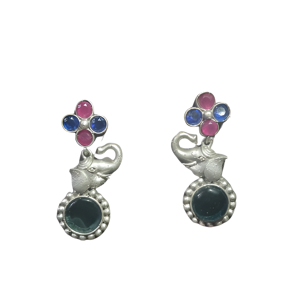 Pair of earrings with elephant design and colorful kundan stones on a white background