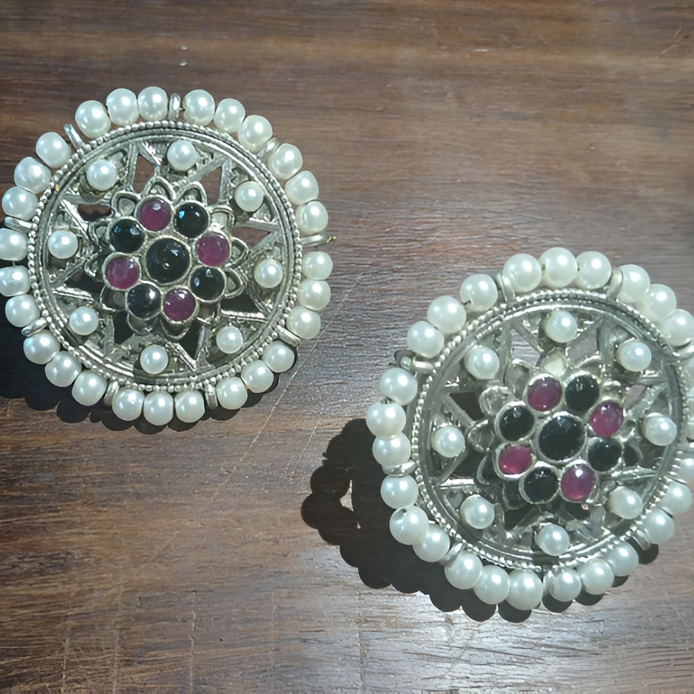 Multicolor Temple Inspired Big Stud Jewellery adorned with all around pearl and kundan at centre .