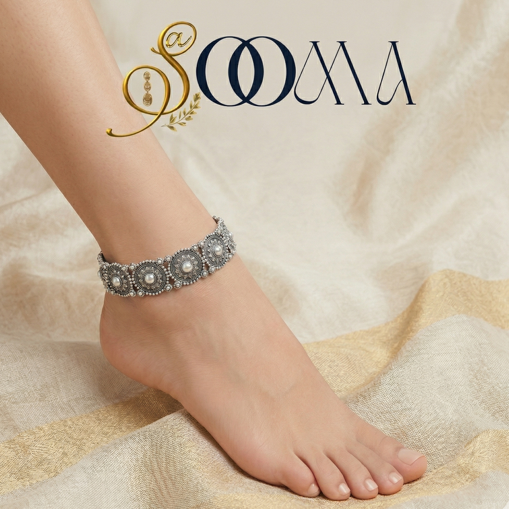 Adjustable ankle bracelet with silver oxidised finish on a woman's ankle.
