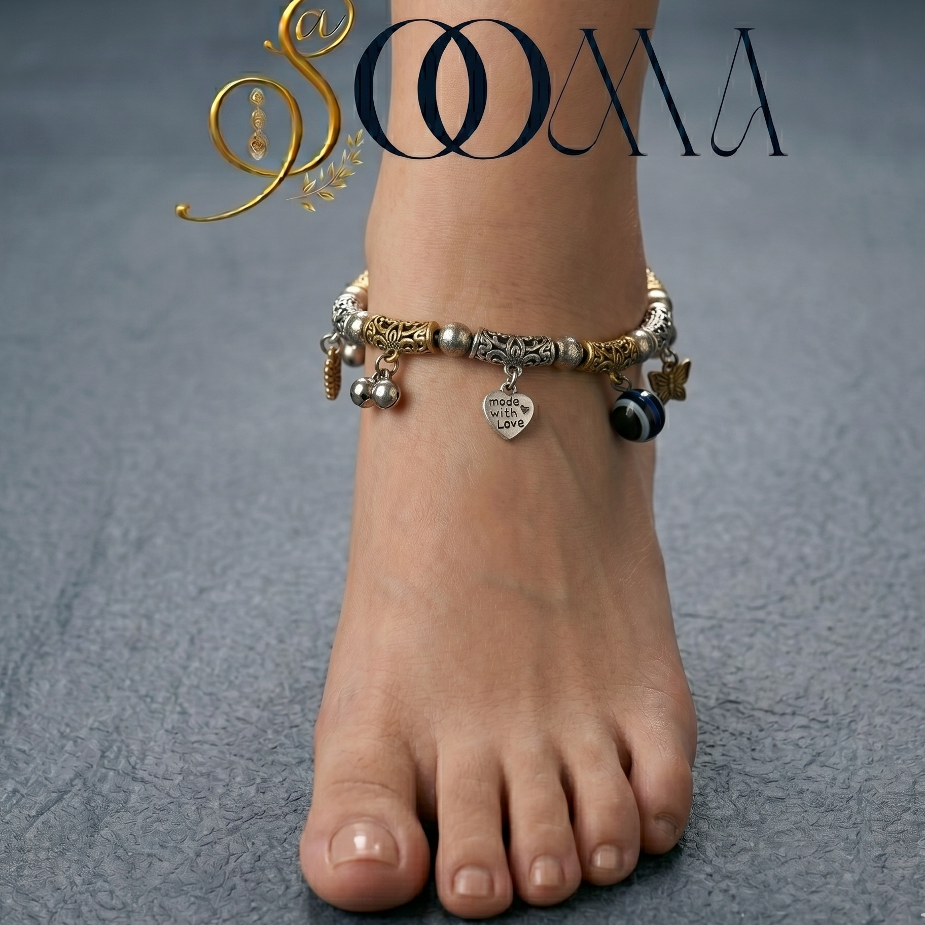 Ankle with multiple bracelets on a gray textured background, featuring the brand 'Sooma'.