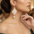 Woman wearing a dangle beaded earrings with pearl accents