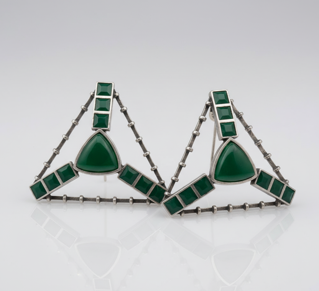 Oversized Triangle Stone Stud Earrings displayed on a model, showcasing their size and design.