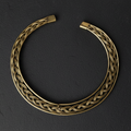 Elegant braided brass hasli necklace, perfect statement officewear for modern Indian woman.