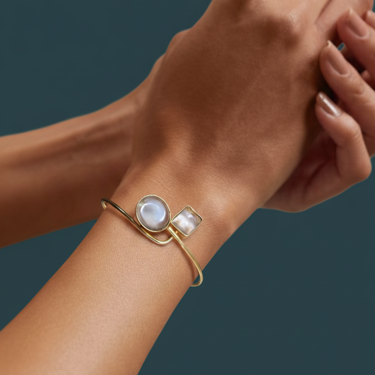 Close-up of a wrist wearing a Elegant clear stone gold plated minimalist 