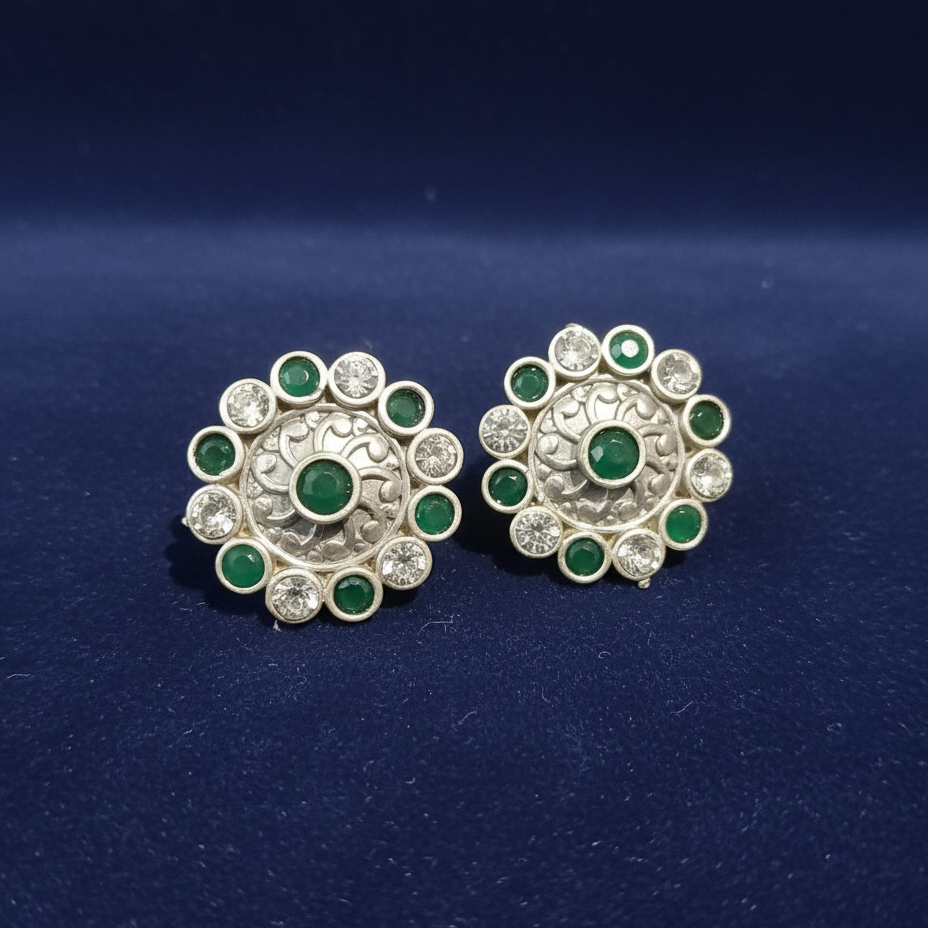 Pair of silver earrings with green & white oxidized silver Kundan 
