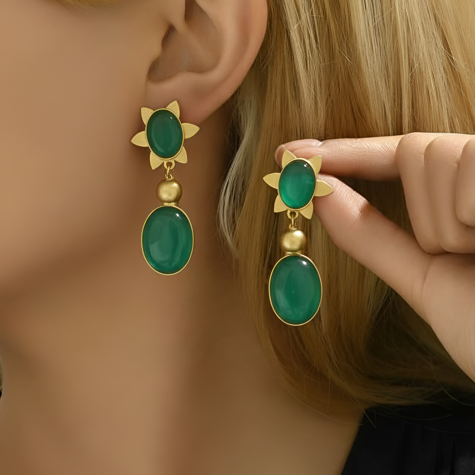 A model wearing Drop & Dangle Stone Earrings with turg stones, perfect for office or party wear
