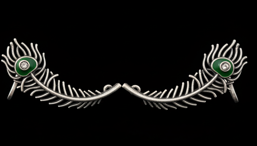 Statement & artistic  peacock earcuff showcasing intricate details and shimmering stones.