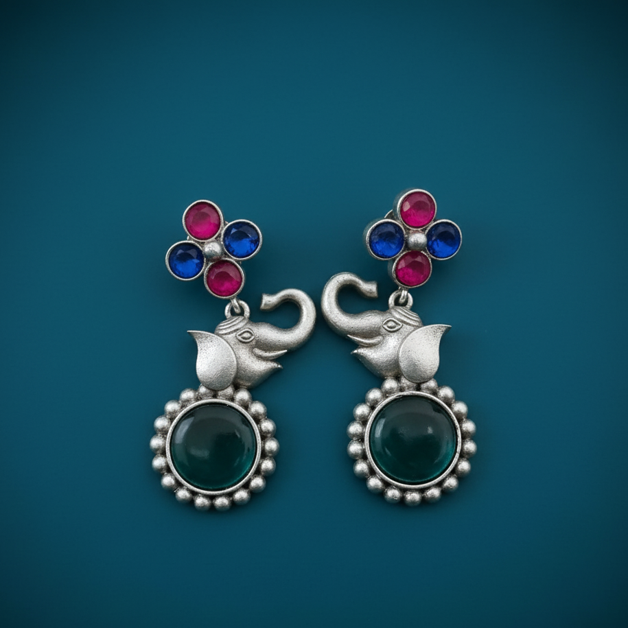 Multicolor Elephant Stone Drop Earrings showcasing intricate stone work and elegant design on Blue Background.