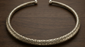 Hasli necklace on wooden surface