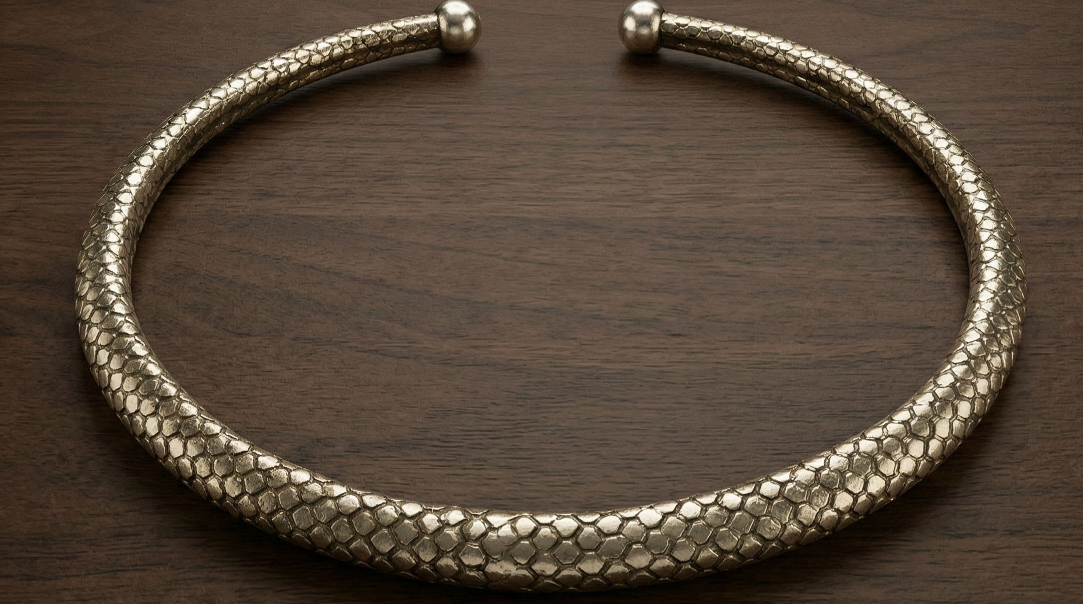 Hasli necklace on wooden surface