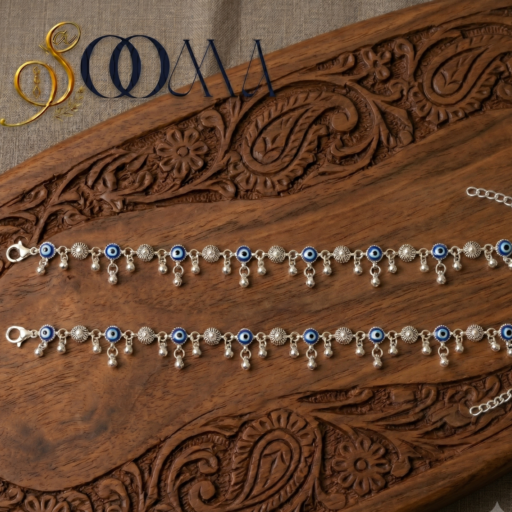 Intricate sunburst framed blue evil eye payal set close up shot