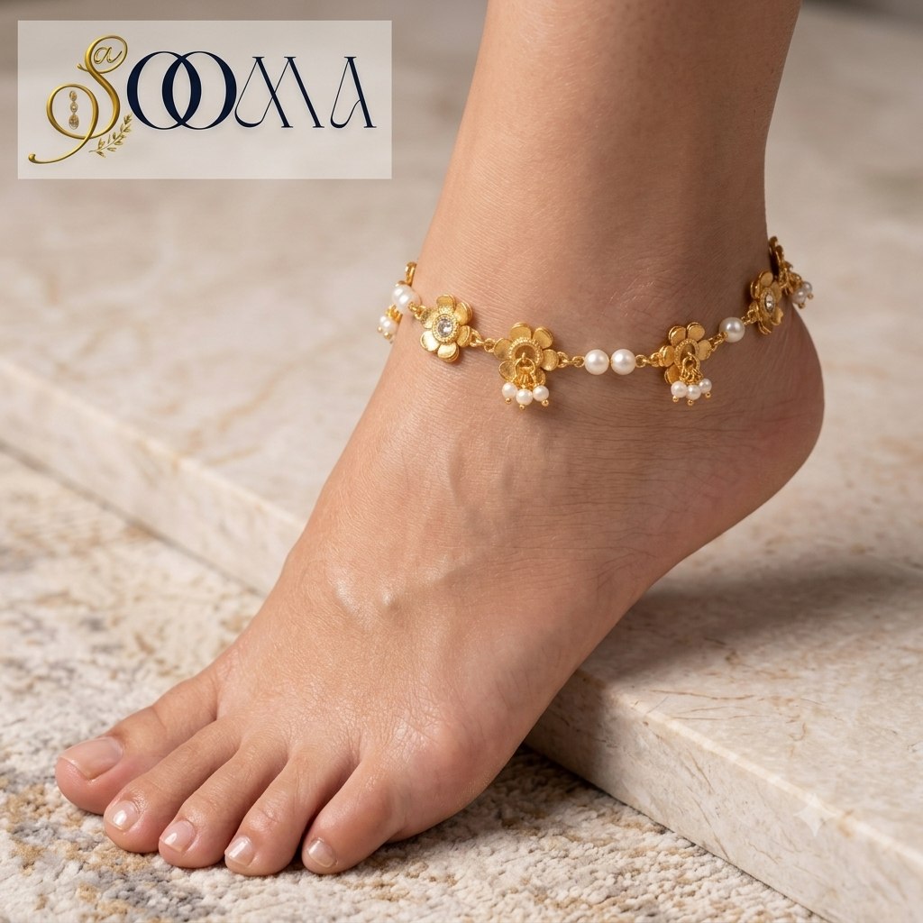 Front view of foot adorned with gold-plated floral pearl chain anklet on beige fabric