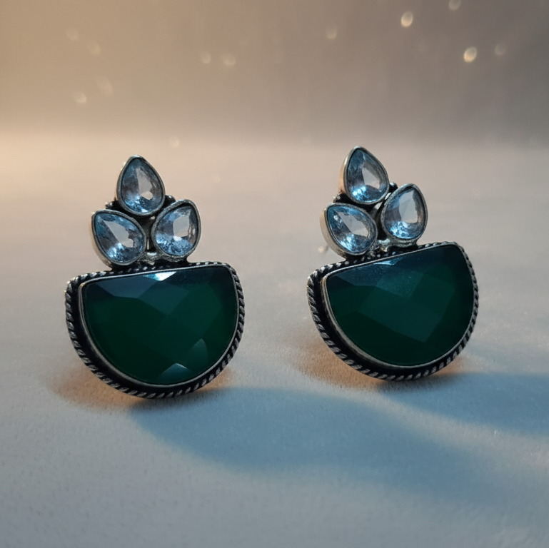 Pair of earrings with green and white stones