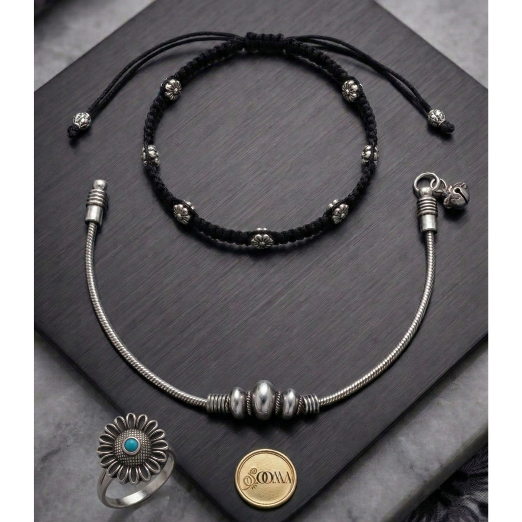 Elegant anklet stack featuring a polished metal finish and subtle stone detailing.