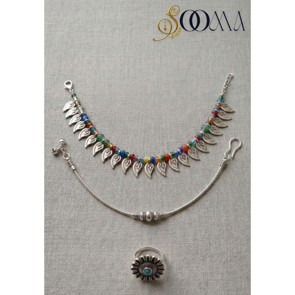 Boho Anklet Stack with Toe Ring featuring multi-colored beads and delicate charms.