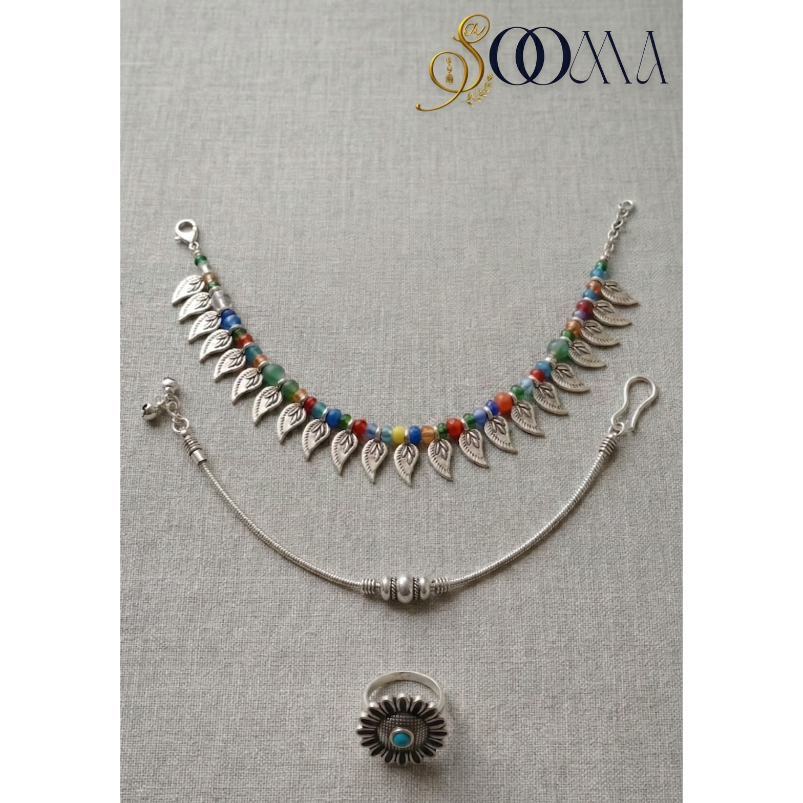 Boho Anklet Stack with Toe Ring featuring multi-colored beads and delicate charms.