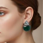 Close-up of a woman wearing green & silver oxidised stone drop earrings