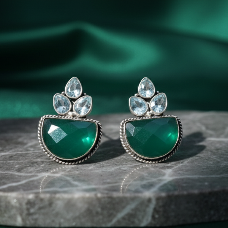 Green & White Oxidised Stone Drop Earrings on Marble Backdround