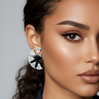 Close-up of a woman wearing a decorative earring with a statement oxidized stone earrings showcasing intricate stone setting and antique finish.