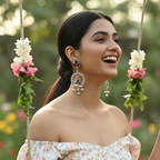 Woman in a floral dress wearing oxidized statement earrings showing intricate detailing and secure stone settings.