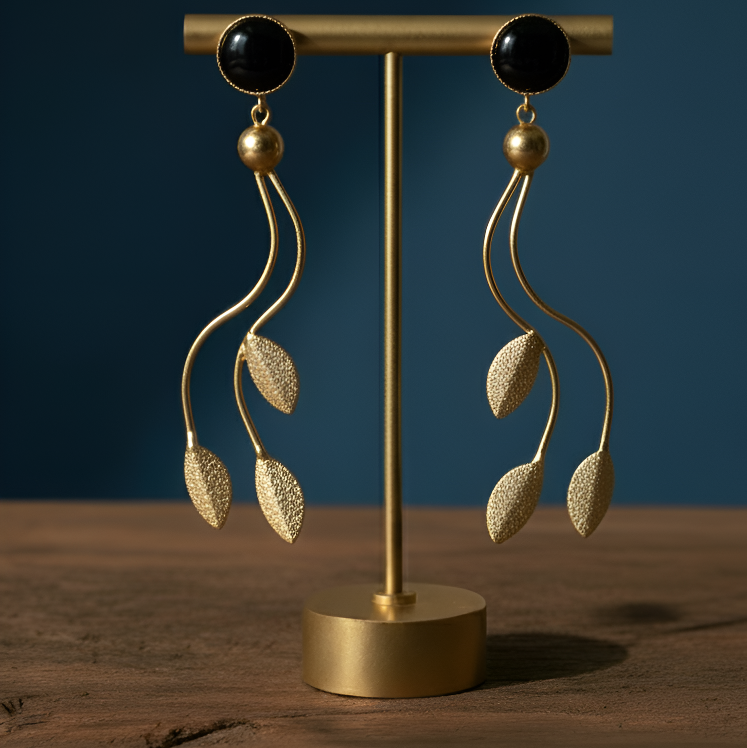 Long cascading geometric gold plated earrings for women, elegant and versatile.