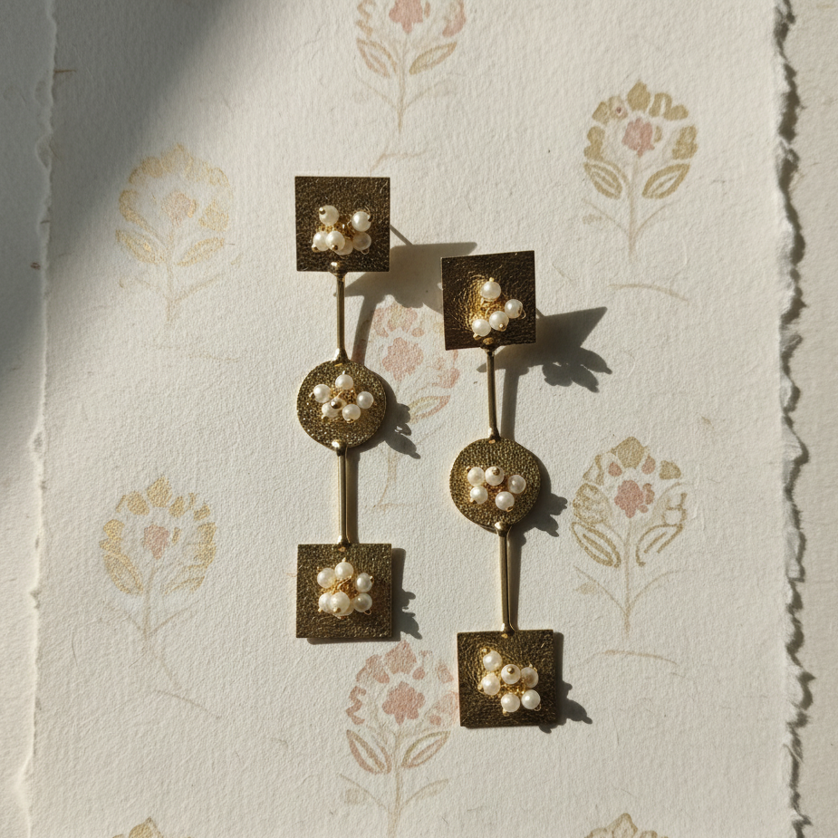 Elegant pearl gold drop earrings, perfect for office and everyday wear.