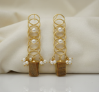 Elegant long hanging stone earrings for women, perfect for office and party wear, on a white background.