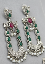 Ornate silver earrings with green stones and red Woman Kundan Drop Earrings