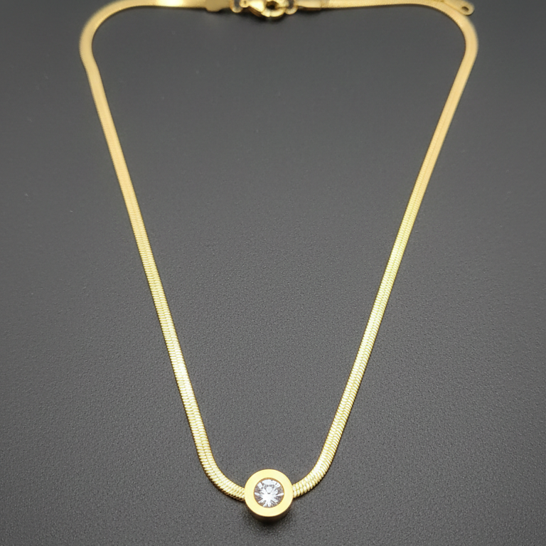 Dainty gold necklace with a polished finish, showcasing its elegant and minimalist design.