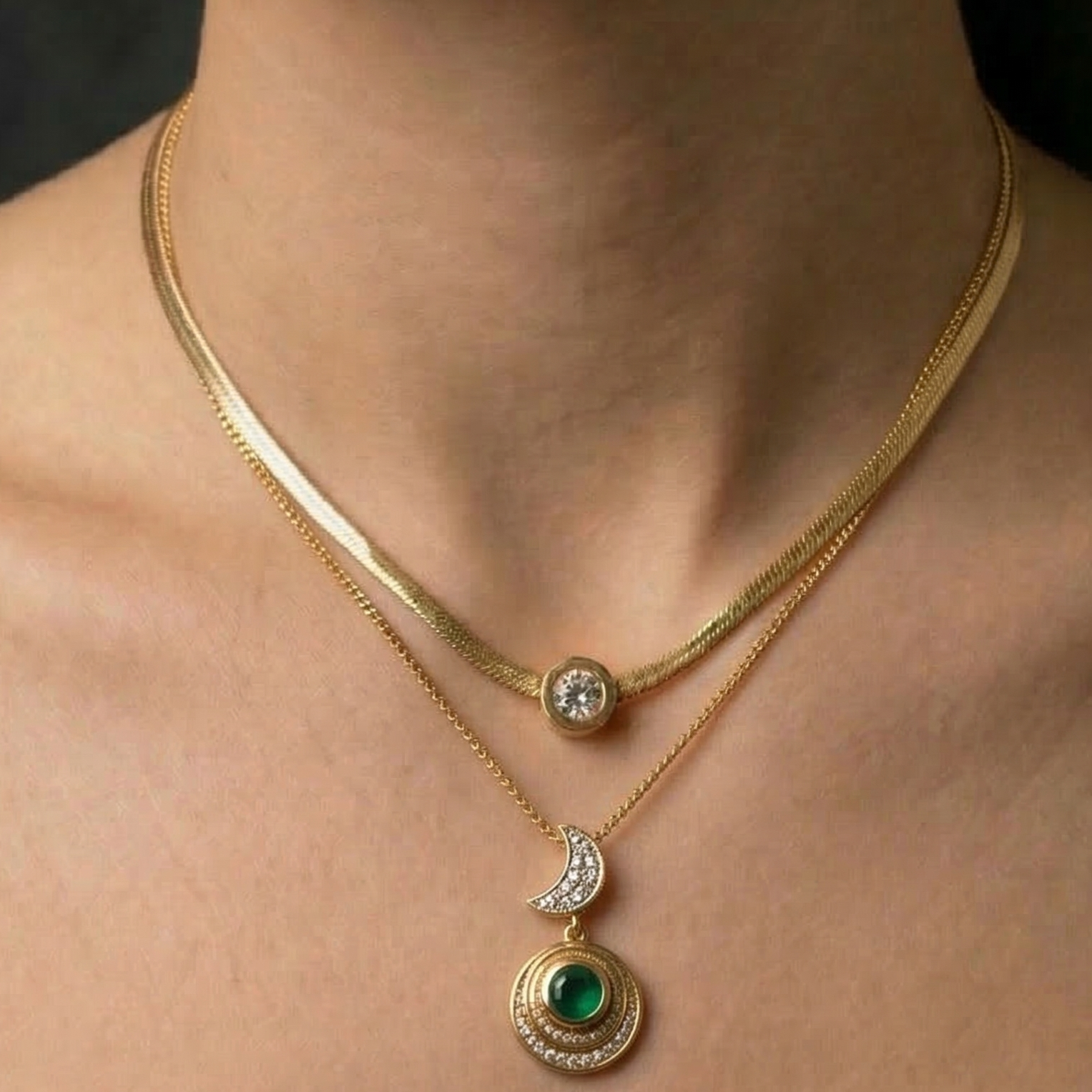 Close-up of a person wearing a gold layered necklace set ideal for office wear.