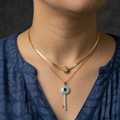 Woman wearing a Evil Eye Necklace Stack for Women