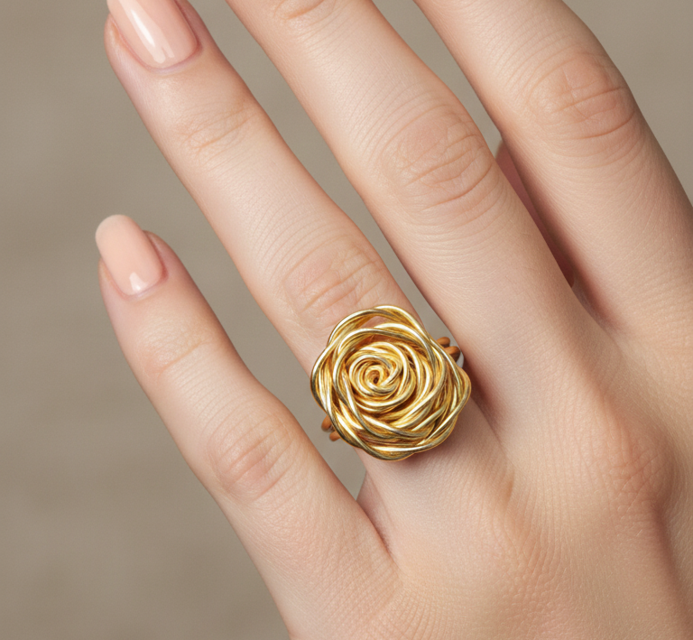 Elegant Pretty Rose Ring on a hand .