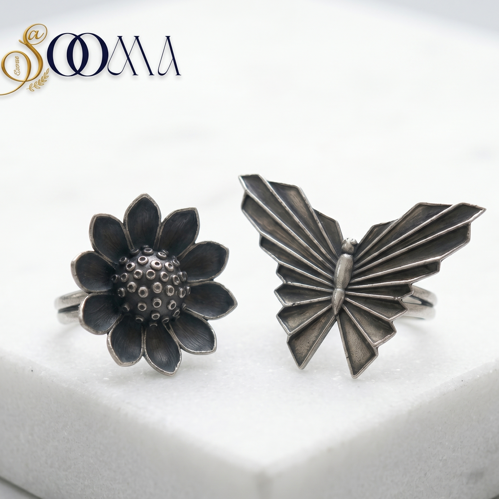 Silver butterfly and flower-shaped cufflinks on a white background with 'Sooma' branding.