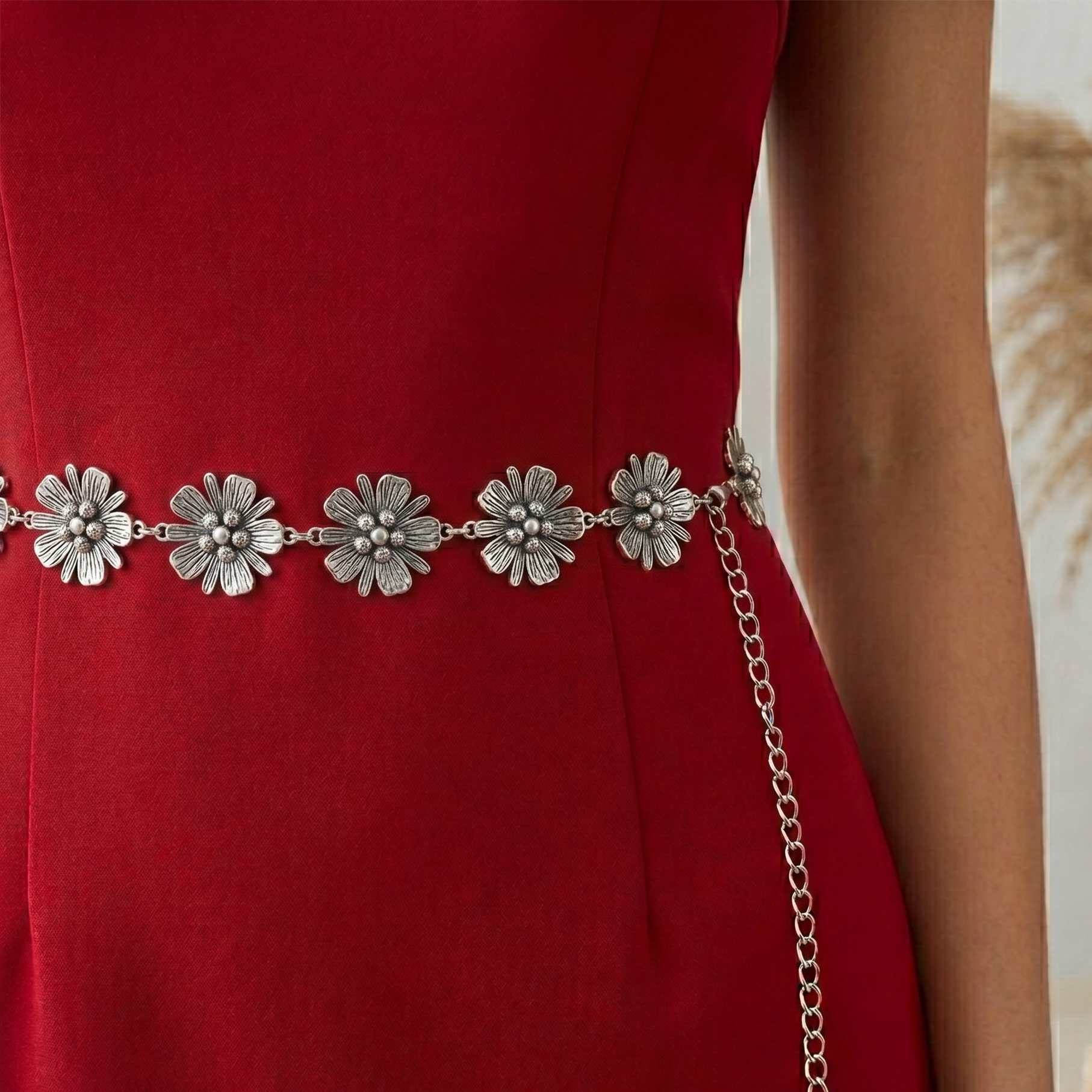 Red dress with a floral silver belt