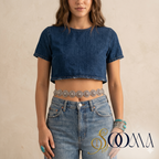 Person wearing a blue denim crop top and elegant waist chain adding a touch of glamour to professional attire