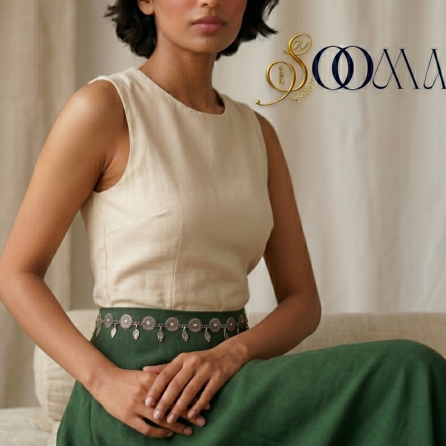 Woman wearing a Sleek flower waist chain with delicate floral design.