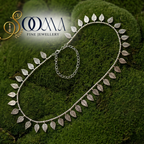 Silver leaf waistbelt on a green moss background with 'Sooma Fine Jewellery' logo.