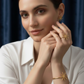 Woman wearing elegant star-themed bracelet, ring, and earrings set for modern women.