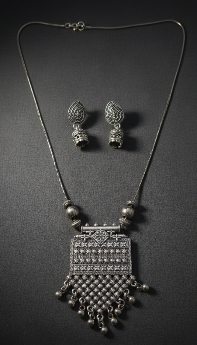 Oxidised pendant set with jhumka detailing