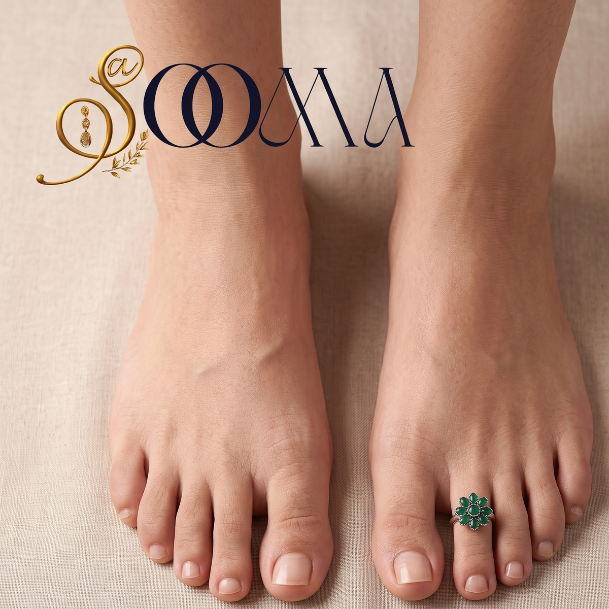 Front view of model feet on linen fabric wearing an oxidized silver green onyx flower toe ring