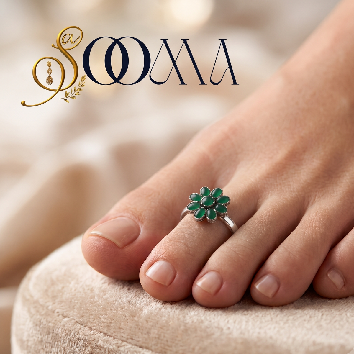 Close-up view of woman foot adorned with an 8-petal green onyx floral cluster toe ring on velvet cushion