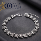 Sooma brand oxidized silver butterfly link chain anklet displayed flat on grey silk with S-hook closure