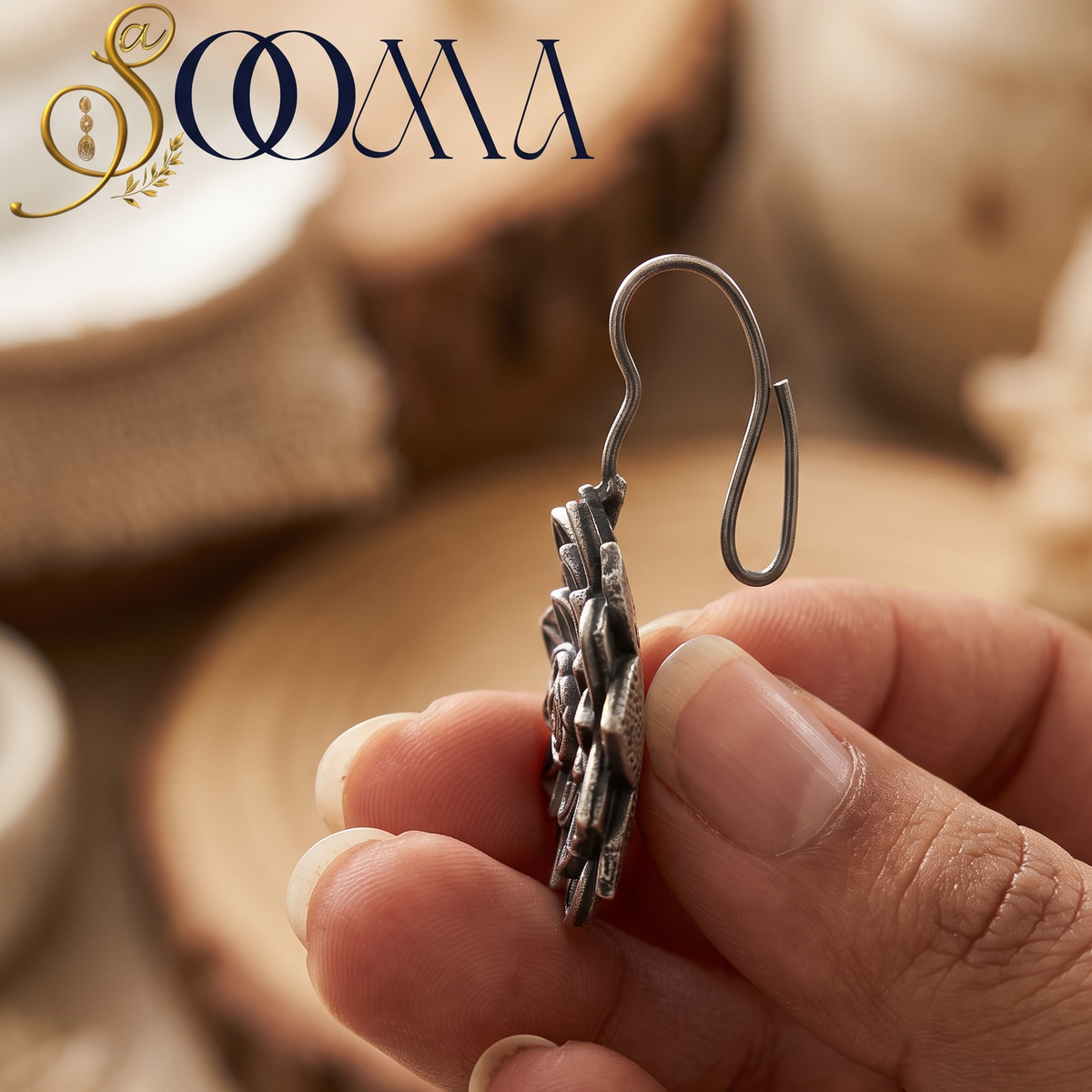 Pair of Sooma brand handcrafted oxidized silver lotus bugadi ear cuffs with yellow citrine centerpieces displayed on red velvet