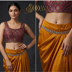 Model in printed brocade blouse and mustard yellow skirt wearing handcrafted oxidized silver butterfly waist belt