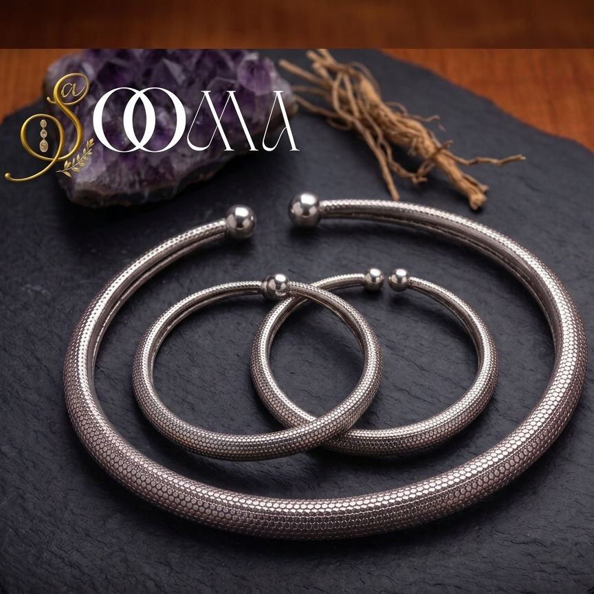 Sooma brand textured silver Hasli neck choker and ankle kada set displayed flat on dark slate surface